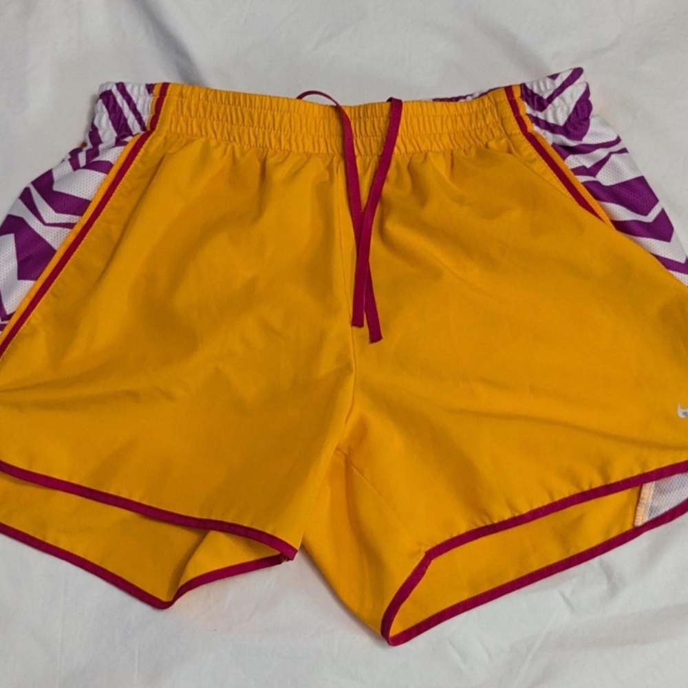 Vibrant Yellow and Purple Athletic Shorts with Dynamic Side Panels